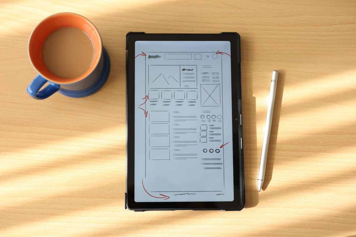 post image website outline UI UX design wireframing with tablet